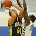 Chelsea's Jake Steinhauer looks to shoot over Skyline's Jarrius Mann during the first half at Skyline on Tuesday night.  Melanie Maxwell I AnnArbor.com